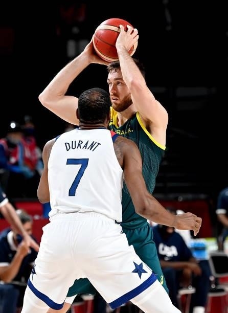 Nic Kay of Australia looks to pass as he is pressured by the defence of Kevin Durant of the USA during the Basketball semi final match between...