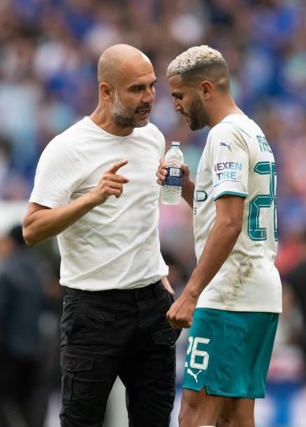 Manchester City Manager Pep Guardiola in conversation with Riyad Mahrez after the The FA Community Shield between Manchester City and Leicester City...