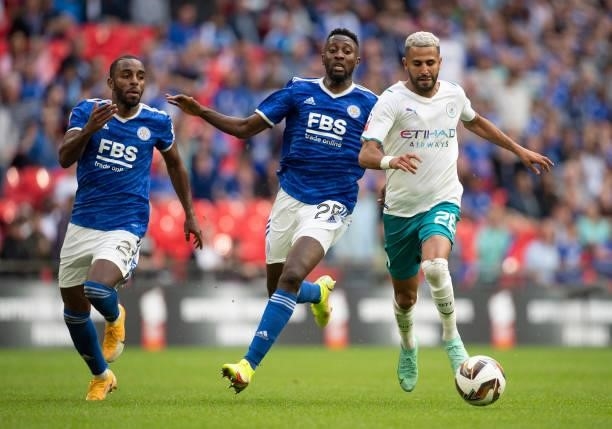 Riyad Mahrez of Manchester City and Ricardo Domingos Barbosa Pereira and Wilfred Ndidi of Leicester City during the The FA Community Shield between...