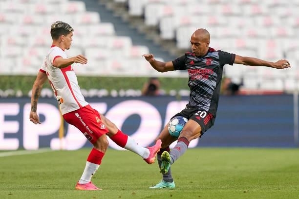 Ayrton Lucas of FC Spartak Moskva competes for the ball with Joao Mario of SL Benfica during the UEFA Champions League Third Qualifying Round Leg Two...