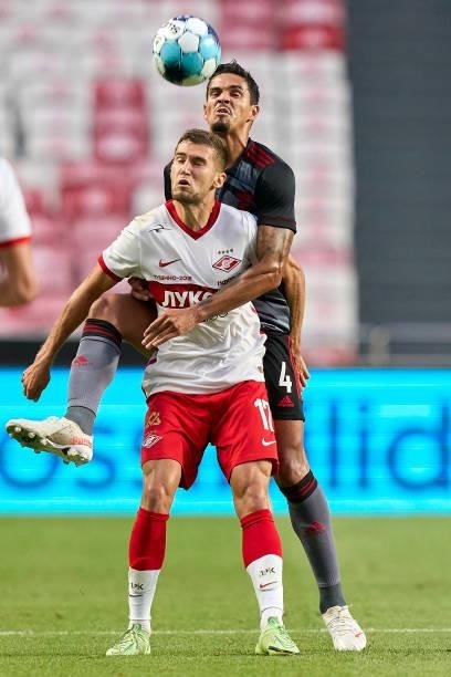 Lucas Verissimo of SL Benfica competes for the ball with Aleksandr Lomovitskiy of FC Spartak Moskva during the UEFA Champions League Third Qualifying...
