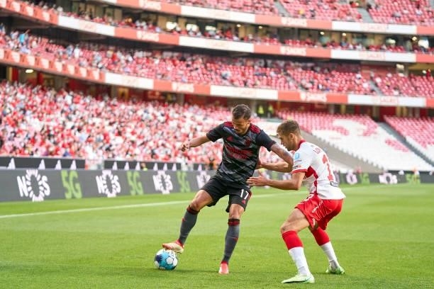 Aleksandr Lomovitskiy of FC Spartak Moskva competes for the ball with Diogo Goncalves of SL Benfica during the UEFA Champions League Third Qualifying...