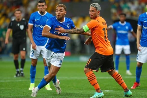 Cyriel Dessers of KRC Genk marks Marlos of Shakhtar Donetsk during the UEFA Champions League: Third Qualifying Round Leg Two match between Shakhtar...