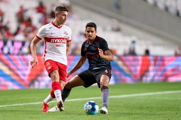 Lucas Verissimo of SL Benfica competes for the ball with Ezequiel Ponce of FC Spartak Moskva during the UEFA Champions League Third Qualifying Round...