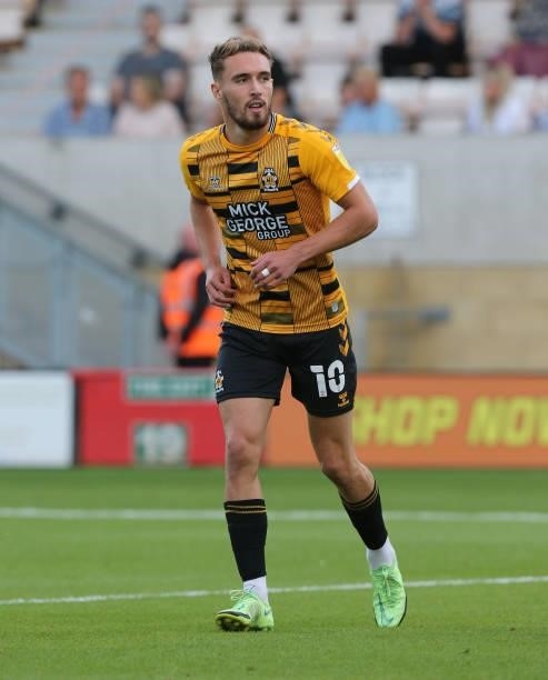 Sam Smith of Cambridge United in action during the Carabao Cup 1st Round match between Cambridge United and Swindon Town at Abbey Stadium on August...