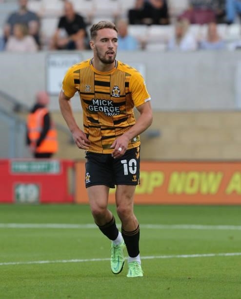 Sam Smith of Cambridge United in action during the Carabao Cup 1st Round match between Cambridge United and Swindon Town at Abbey Stadium on August...