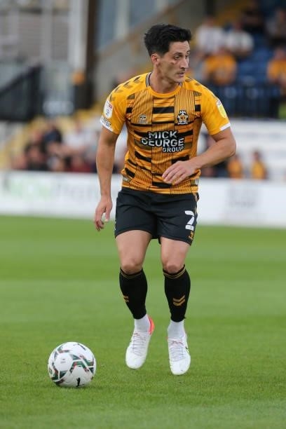 George Williams of Cambridge United in action during the Carabao Cup 1st Round match between Cambridge United and Swindon Town at Abbey Stadium on...