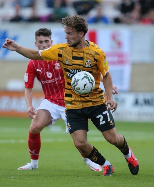 Ben Worman of Cambridge United in action during the Carabao Cup 1st Round match between Cambridge United and Swindon Town at Abbey Stadium on August...