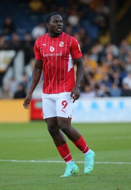 Tyreece Simpson of Swindon Town in action during the Carabao Cup 1st Round match between Cambridge United and Swindon Town at Abbey Stadium on August...