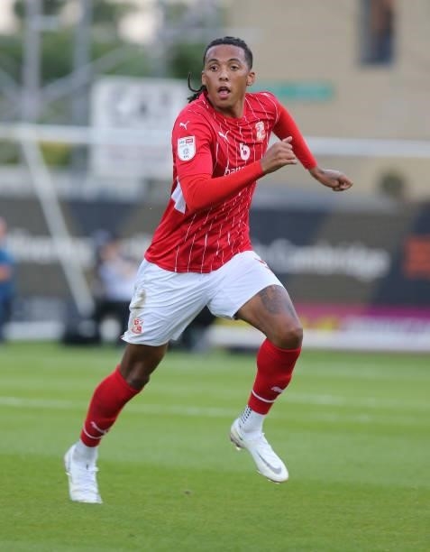 Romoney Crichlow of Swindon Town in action during the Carabao Cup 1st Round match between Cambridge United and Swindon Town at Abbey Stadium on...