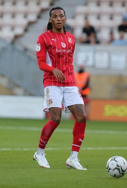 Romoney Crichlow of Swindon Town in action during the Carabao Cup 1st Round match between Cambridge United and Swindon Town at Abbey Stadium on...