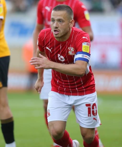 Jack Payne of Swindon Town in action during the Carabao Cup 1st Round match between Cambridge United and Swindon Town at Abbey Stadium on August 10,...
