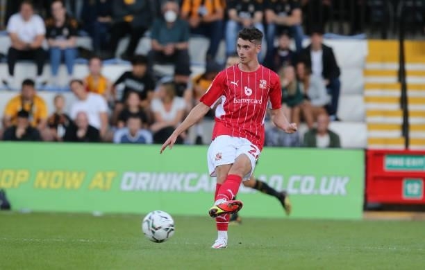 Ryan East of Swindon Town in action during the Carabao Cup 1st Round match between Cambridge United and Swindon Town at Abbey Stadium on August 10,...