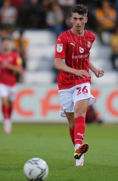 Ryan East of Swindon Town in action during the Carabao Cup 1st Round match between Cambridge United and Swindon Town at Abbey Stadium on August 10,...