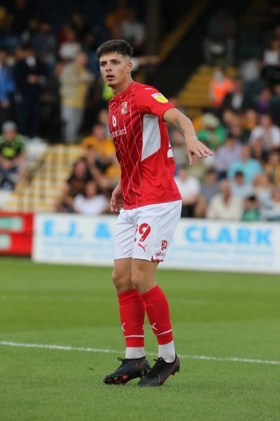 Harry Parsons of Swindon Town in action during the Carabao Cup 1st Round match between Cambridge United and Swindon Town at Abbey Stadium on August...
