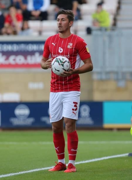 Ellis Iandolo of Swindon Town in action during the Carabao Cup 1st Round match between Cambridge United and Swindon Town at Abbey Stadium on August...