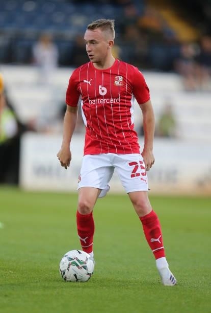 Louis Reed of Swindon Town in action during the Carabao Cup 1st Round match between Cambridge United and Swindon Town at Abbey Stadium on August 10,...