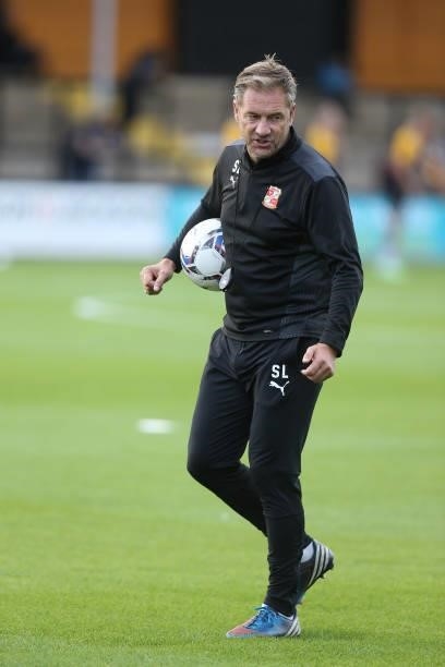 Swindon Town assistant coach Scott Lindsay during the pre match warm up prior to the Carabao Cup 1st Round match between Cambridge United and Swindon...