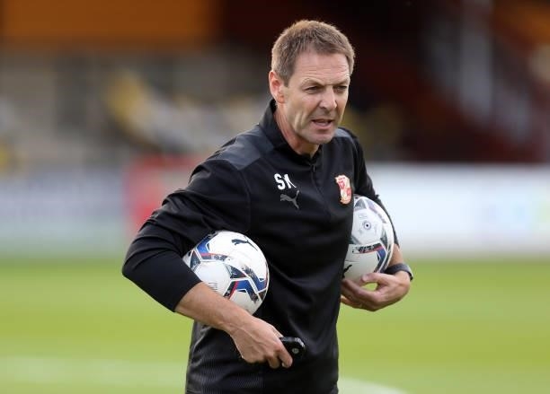 Swindon Town assistant coach Scott Marshall during the pre match warm up prior to the Carabao Cup 1st Round match between Cambridge United and...