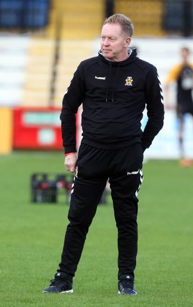 Cambridge United assistant manager Gary Waddock looks on prior to the Carabao Cup 1st Round match between Cambridge United and Swindon Town at Abbey...