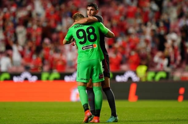 Roman Yaremchuk of SL Benfica with Aleks Maksimenko of Spartak Moskva at the end of the UEFA Champions League : Third Qualifying Round Leg Two match...