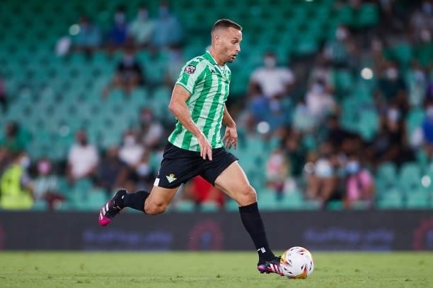 Sergio Canales of Real Betis in action during a friendly match between Real Betis and AS Roma at Estadio Benito Villamarin on August 07, 2021 in...