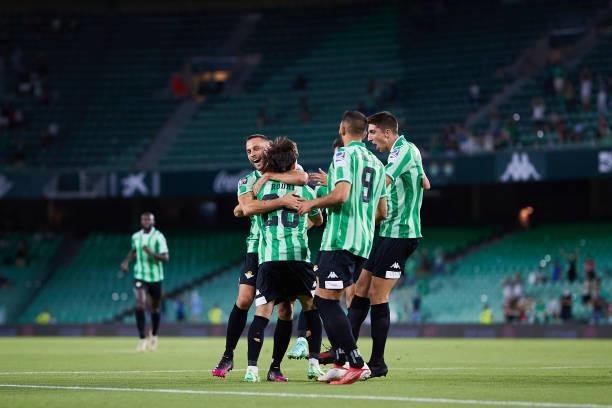 Rodri Sanchez of Real Betis celebrates scoring a goal with team mates during a friendly match between Real Betis and AS Roma at Estadio Benito...