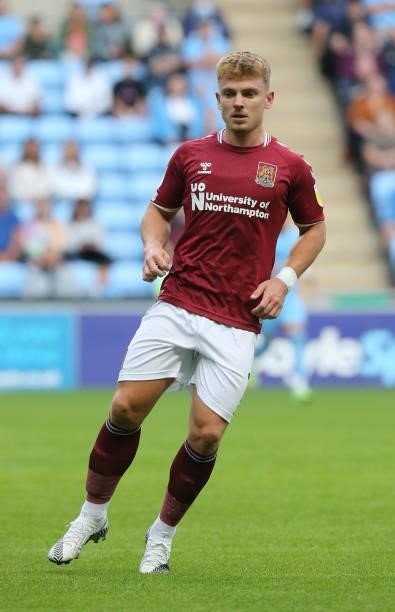 Sam Hoskins of Northampton Town in action during the Carabao Cup 1st round match between Coventry City and Northampton Town at The Coventry Building...