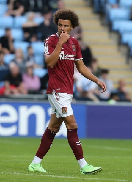 Shaun McWilliams of Northampton Town in action during the Carabao Cup 1st round match between Coventry City and Northampton Town at The Coventry...