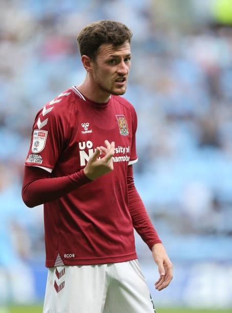 Paul Lewis of Northampton Town in action during the Carabao Cup 1st round match between Coventry City and Northampton Town at The Coventry Building...