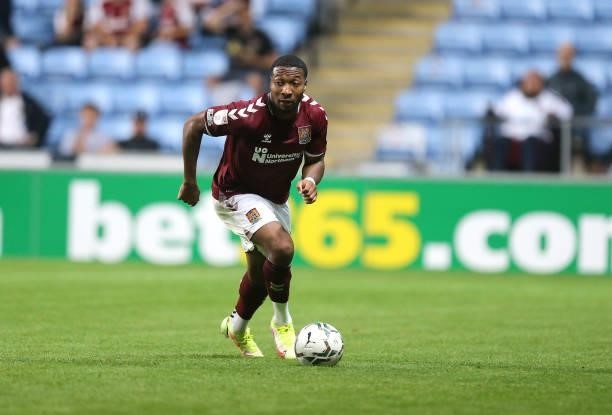 Ali Koiki of Northampton Town in action during the Carabao Cup 1st round match between Coventry City and Northampton Town at The Coventry Building...