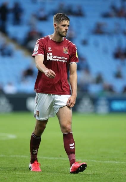 Jon Guthrie of Northampton Town in action during the Carabao Cup 1st round match between Coventry City and Northampton Town at The Coventry Building...