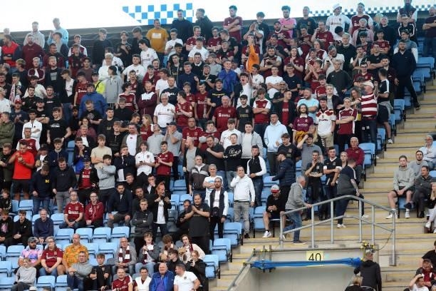 Northampton Town fans look on during the Carabao Cup 1st round match between Coventry City and Northampton Town at The Coventry Building Society...
