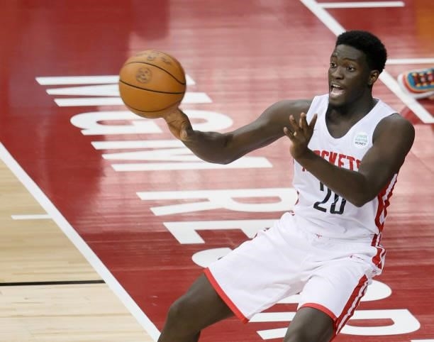 Khyri Thomas of the Houston Rockets gets rid of the ball as he falls out of bounds during a game against the Detroit Pistons during the 2021 NBA...