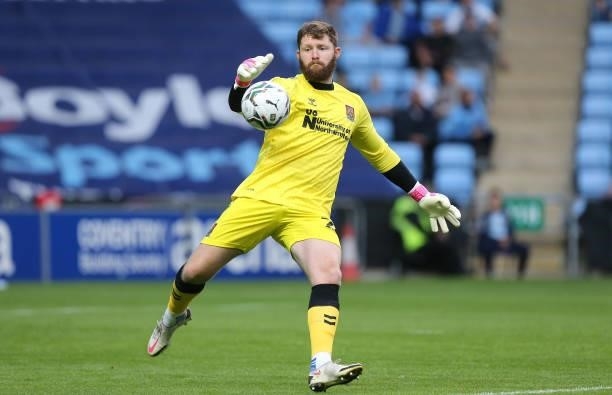Jonny Maxted of Northampton Town in action during the Carabao Cup 1st round match between Coventry City and Northampton Town at The Coventry Building...