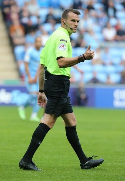 Referee Benjamin Speedie in action during the Carabao Cup 1st round match between Coventry City and Northampton Town at The Coventry Building Society...
