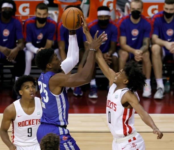 Tyler Cook of the Detroit Pistons is fouled as he shoots by Jalen Green of the Houston Rockets during the 2021 NBA Summer League at the Thomas & Mack...
