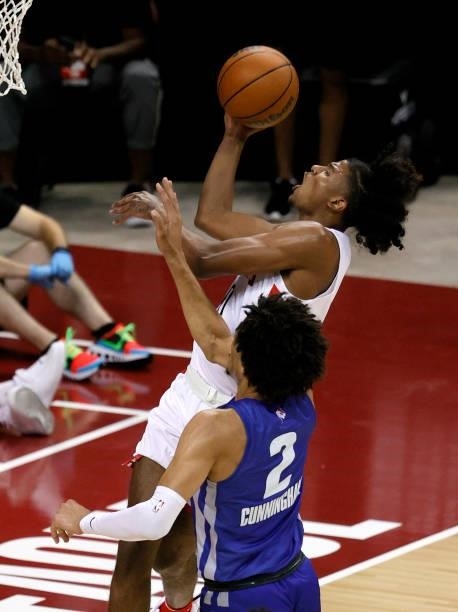 Jalen Green of the Houston Rockets is fouled as he drives to the basket against Cade Cunningham of the Detroit Pistons during the 2021 NBA Summer...