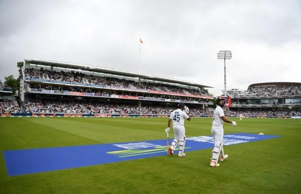 Rahul and Rohit Sharma of India take to the field ahead of day one of the Second LV= Insurance Test Match between England and India at Lord's Cricket...
