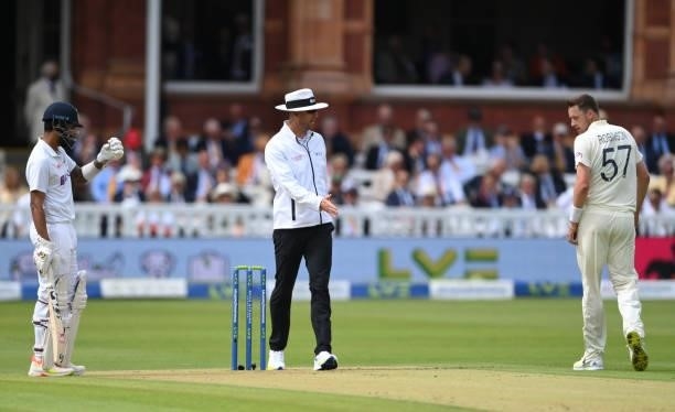 England bowler Ollie Robinson is spoke to by umpire Michael Gough during day one of the Second Test Match between England and India at Lord's Cricket...