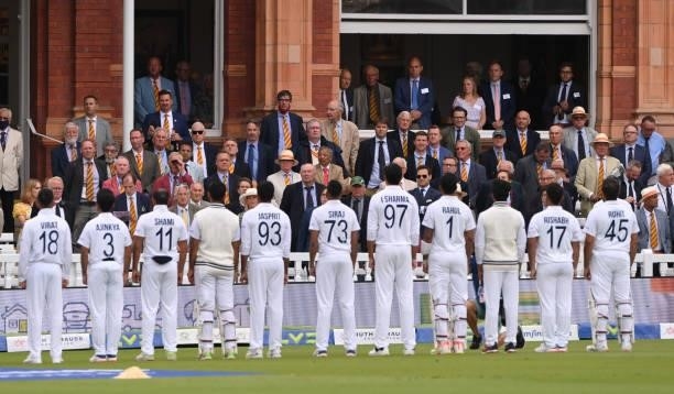 Members look on as the India team line up for the national anthem during day one of the Second Test Match between England and India at Lord's Cricket...