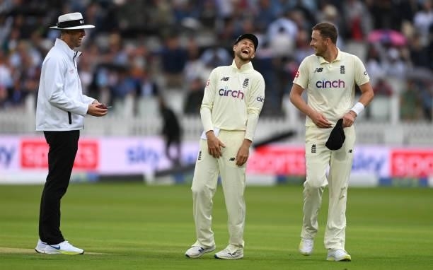 England captain Joe Root shares a joke with Ollie Robinson during day one of the Second LV= Insurance Test Match between England and India at Lord's...