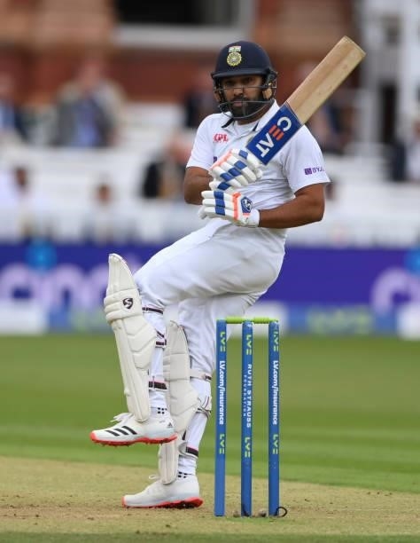 India batsman Rohit Sharma pulls a ball from Mark Wood to the boundary during day one of the Second Test Match between England and India at Lord's...