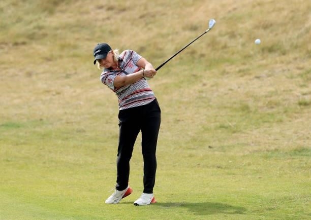 Becky Morgan of Wales plays her second shot on the 18th hole during the first round of the Trust Golf Women's Scottish Open at Dumbarnie Links on...