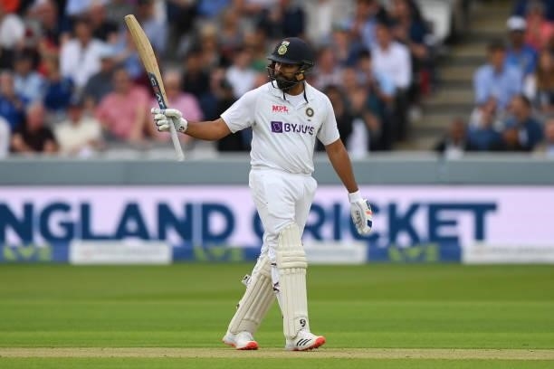Rohit Sharma of India raises his bat after reaching 50 during the Second LV= Insurance Test Match: Day One between England and India at Lord's...