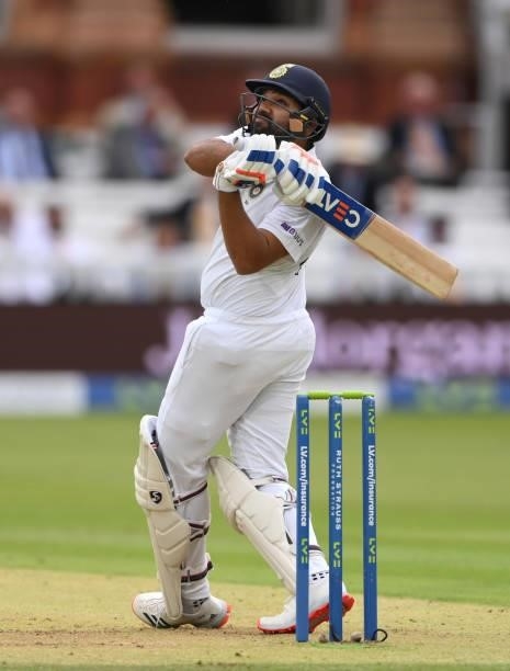 India batsman Rohit Sharma pulls a ball from Mark Wood for 6 runs during day one of the Second Test Match between England and India at Lord's Cricket...