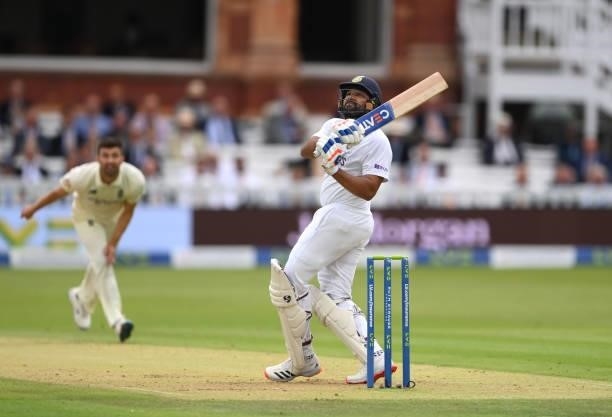 India batsman Rohit Sharma pulls a ball from Mark Wood for 6 runs during day one of the Second Test Match between England and India at Lord's Cricket...