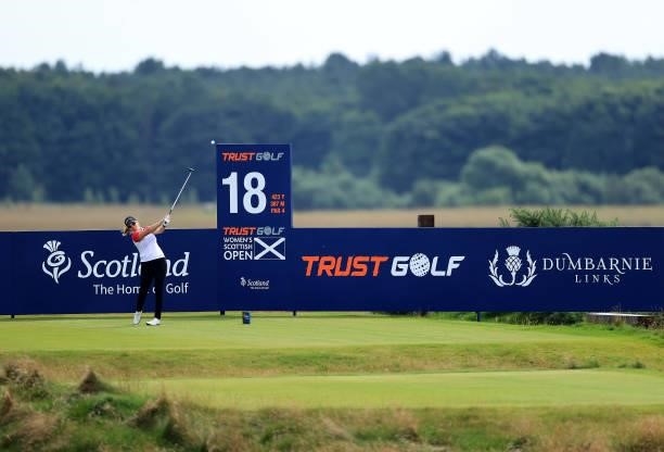 Hannah Burke of England plays her tee shot on the 18th hole during the first round of the Trust Golf Women's Scottish Open at Dumbarnie Links on...