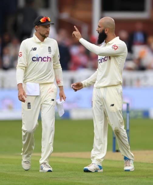 England bowler Moeen Ali sets his field with Joe Root before bowling his first ball during day one of the Second Test Match between England and India...