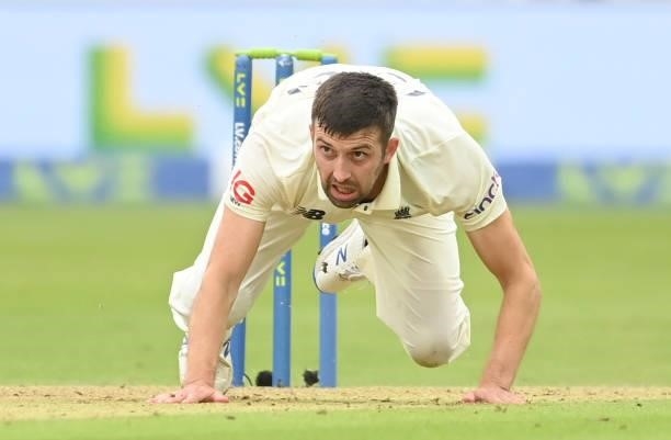 Mark Wood of England falls over after bowling during the 2nd LV= Test match between England and India at Lord's Cricket Ground on August 12, 2021 in...